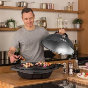 George Foreman Grill 2in1 Elektrogrill [Testsieger]: Standgrill & Tischgrill (Innen- & Außennutzung, Balkon & Küche, Ø44,5cm, Temperaturanzeige, Fettauffangschale, 2400W) Kugelgrill 22460-56, Schwarz 26